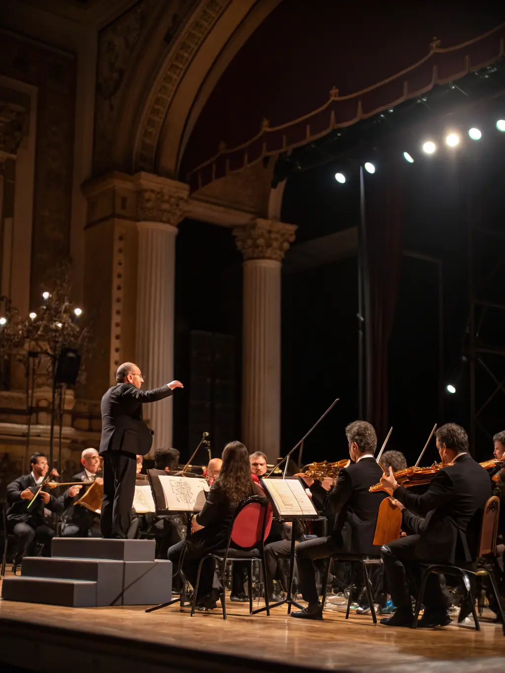 A vibrant photo of a youth orchestra performing on stage, showcasing the energy and passion of young musicians.